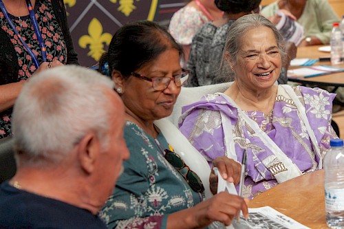 Activity group guests taking part in a quiz
