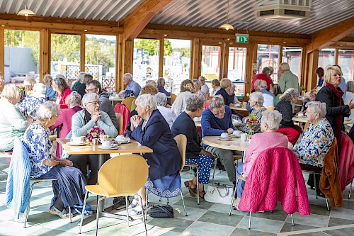 Tea party guests in Brechin chatting