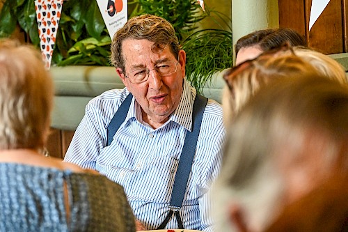 Trevor Lyttleton MBE, chatting to guests at our 60th anniversary celebration in Chatsworth House