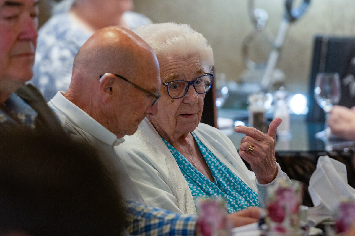 Two people chatting at an event