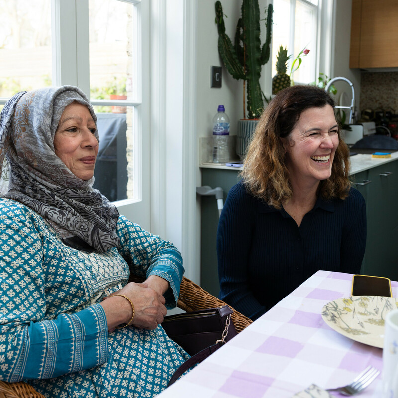 Two people enjoying a Tea Party